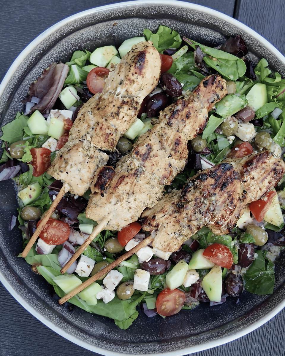 Grilled Chicken Skewers Over Mediterranean Salad